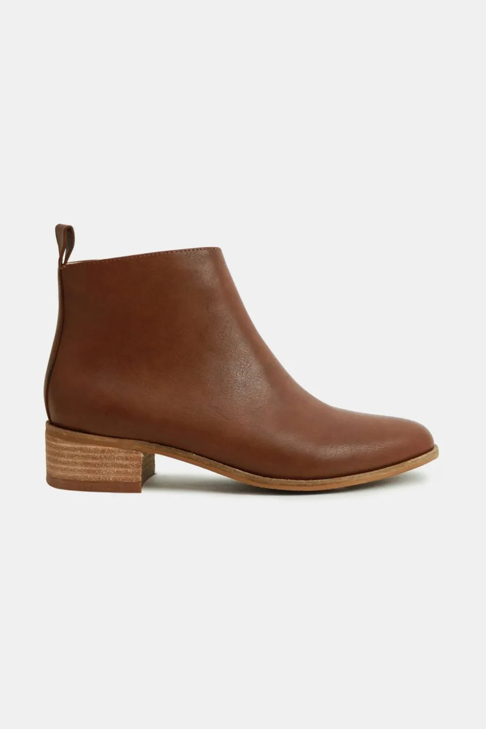 Brown leather ankle boot on a white background