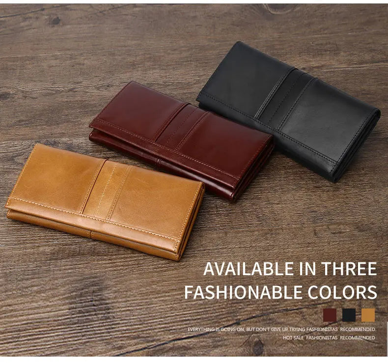Three leather wallets in brown, black, and tan on a wooden surface with text indicating color availability.