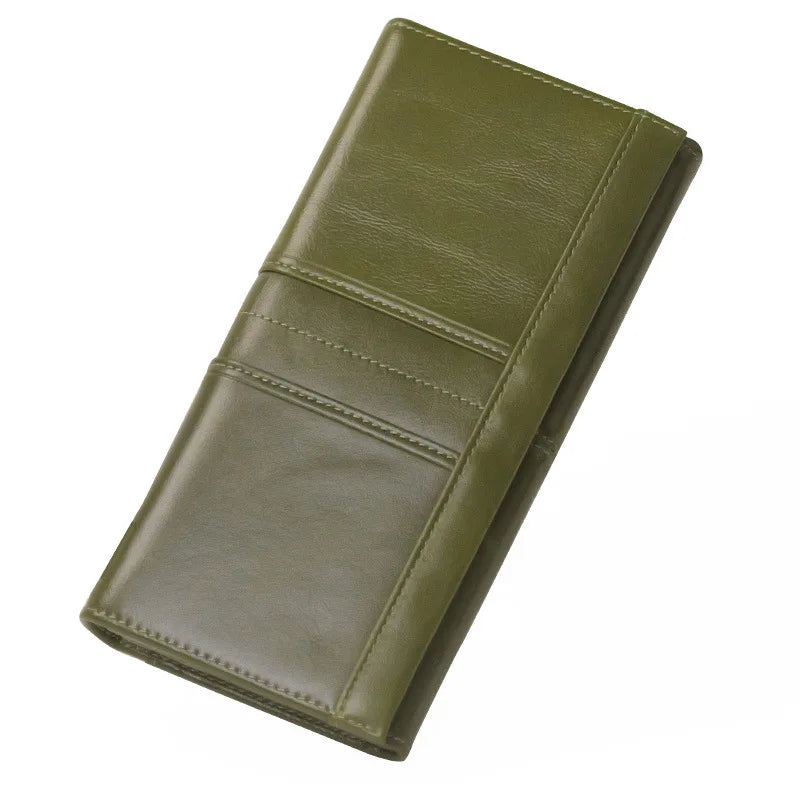 Green leather wallet on a white background