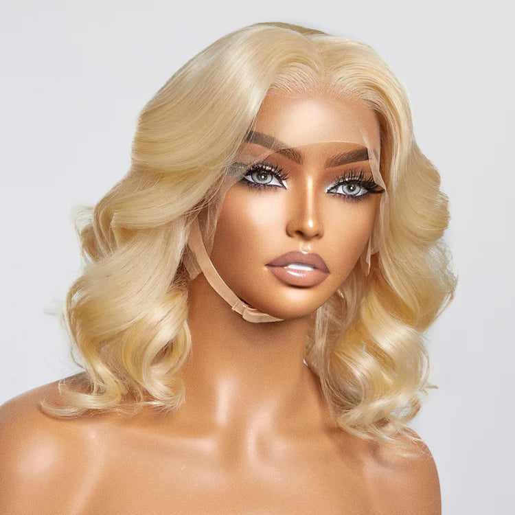 Mannequin head with blonde wig on a white background