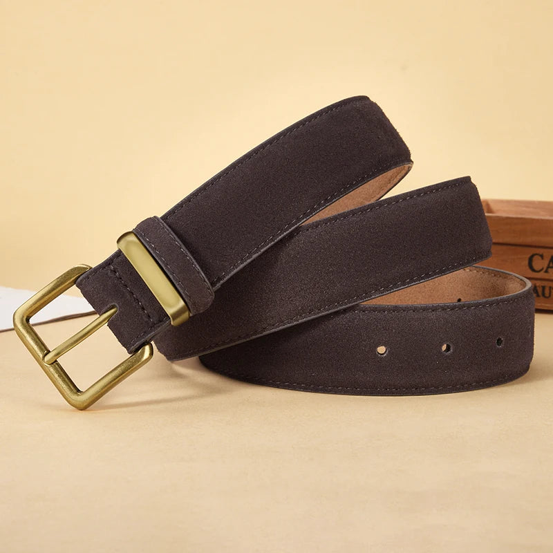Brown belt with a gold buckle on a beige background