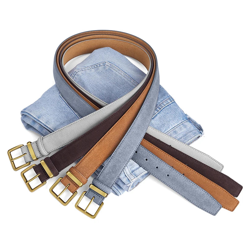 Set of belts with gold buckles on a white background