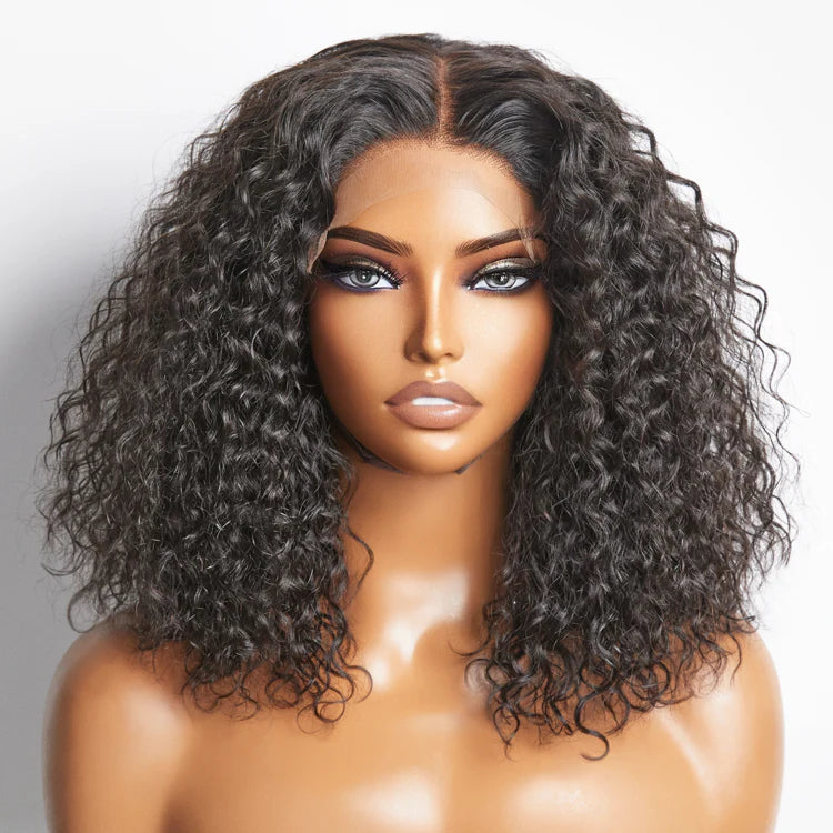 Mannequin head with a black curly wig on a white background