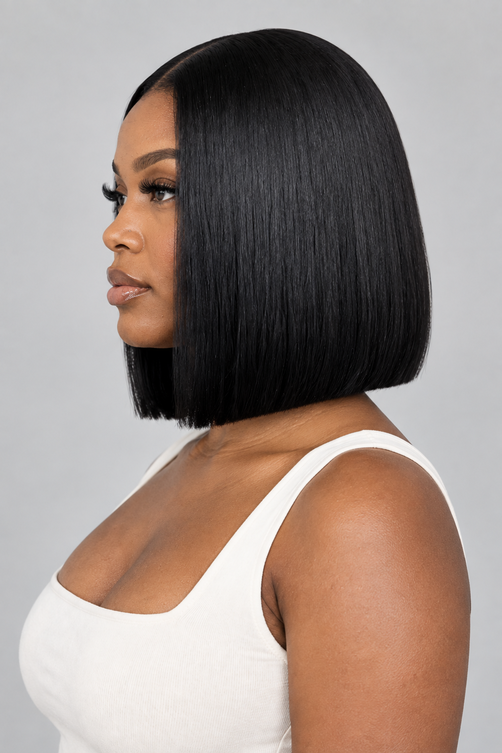 Black center-part bob side profile