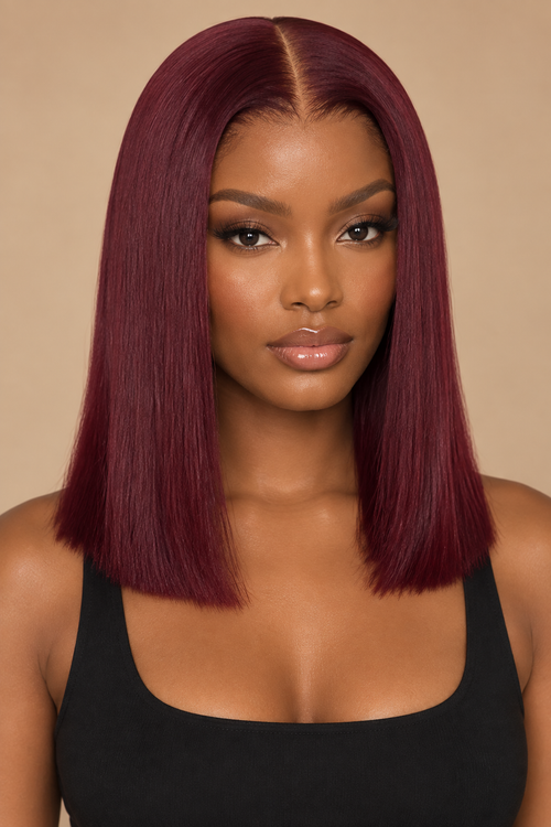 Burgundy wig on dark-skinned Black model