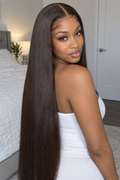 Chocolate-brown straight wig on model, back three-quarter view