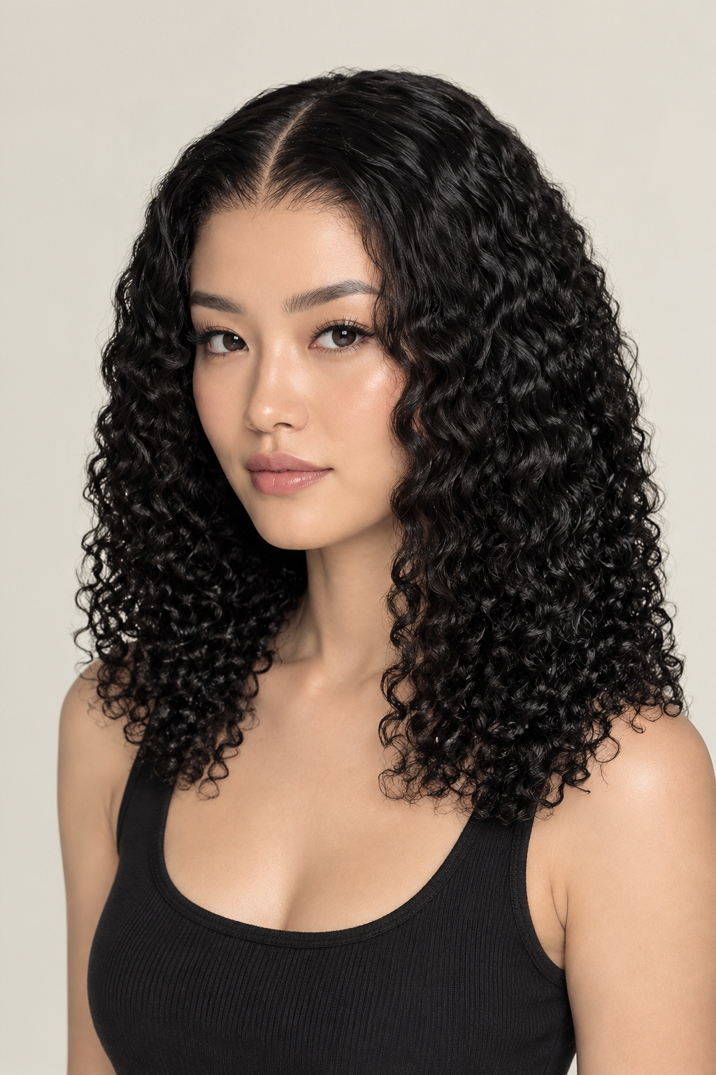Corrected curly-wave wig on model, front view