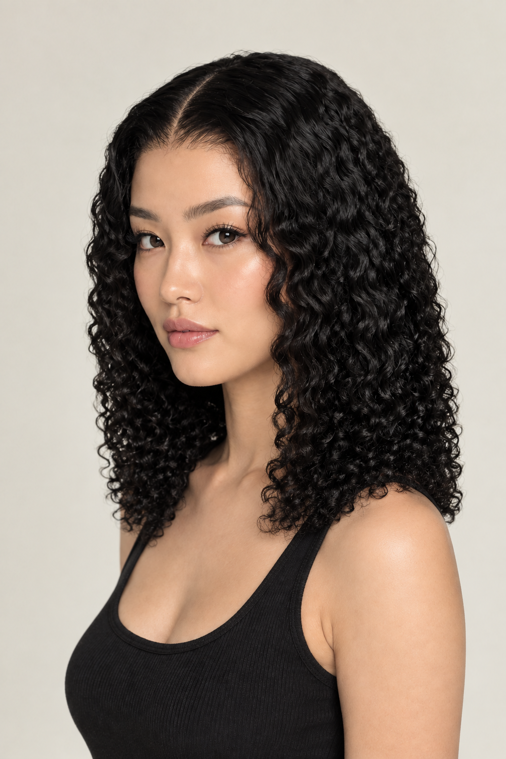 Corrected curly-wave wig on model, side view