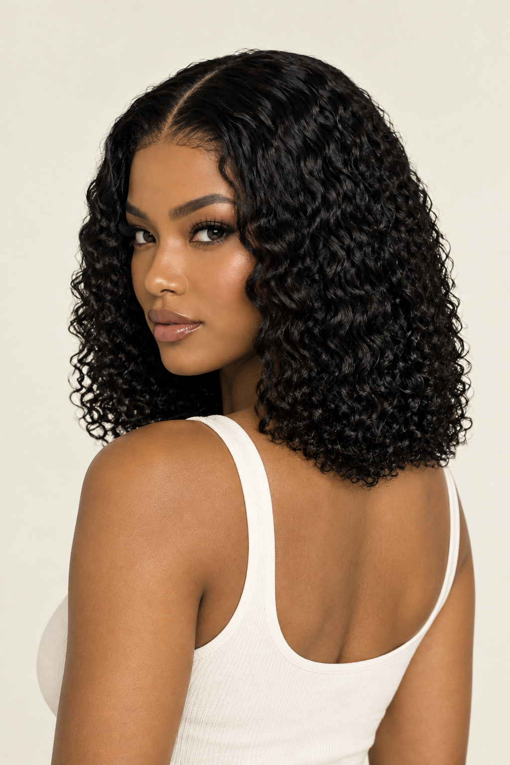 Curly-wave bob wig on Black model, back three-quarter view