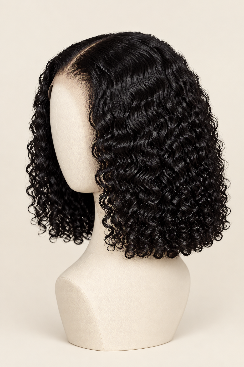 Curly-wave bob wig on mannequin, back three-quarter view
