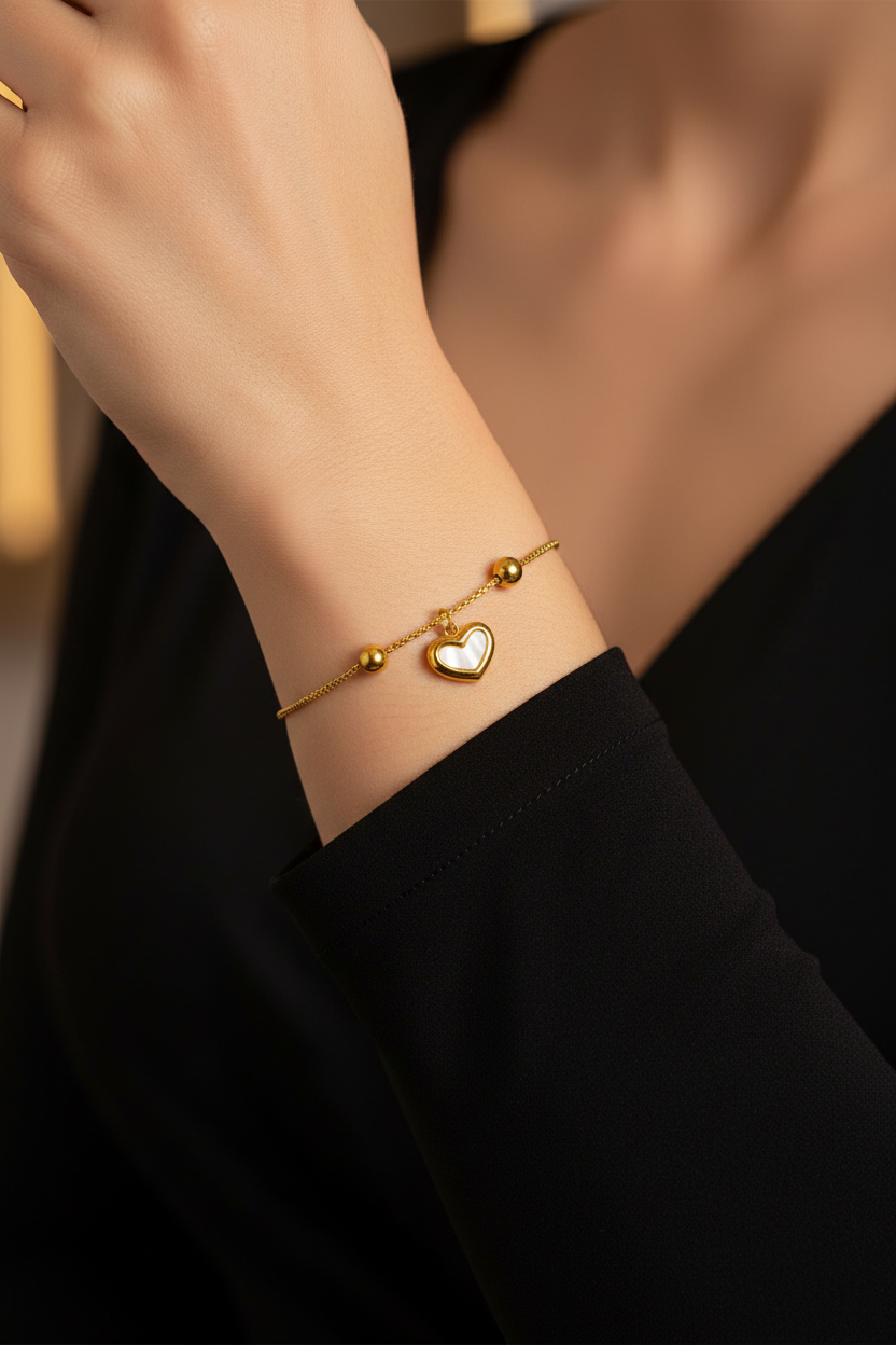 Gold heart bracelet evening pin