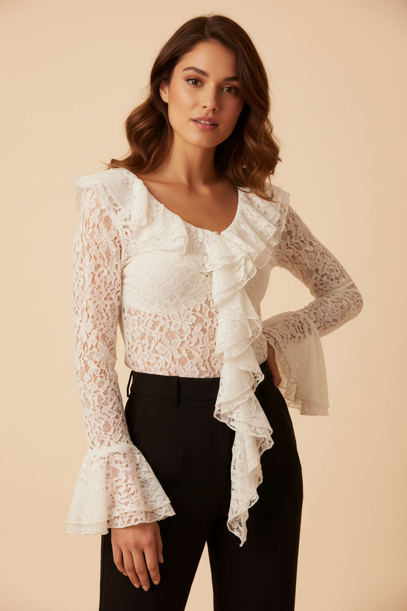 Model wearing a white lace tie-front blouse with flared sleeves and layered ruffle cuffs