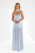 Model wearing the light blue adjustable-strap maxi cami dress with its matching short scarf