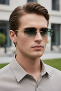 Rimless rectangular UV400 sunglasses with green gradient lenses and copper frame worn by a model