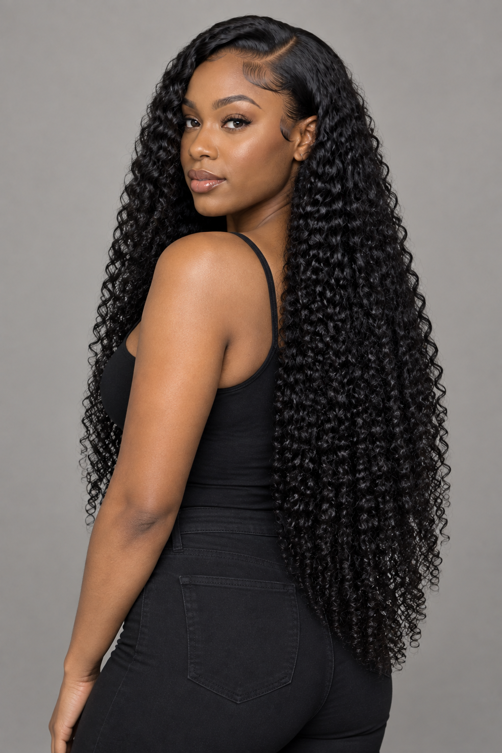 Long Burmese curly wig, full hair back three-quarter view