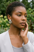 Silver earrings — botanical close-up