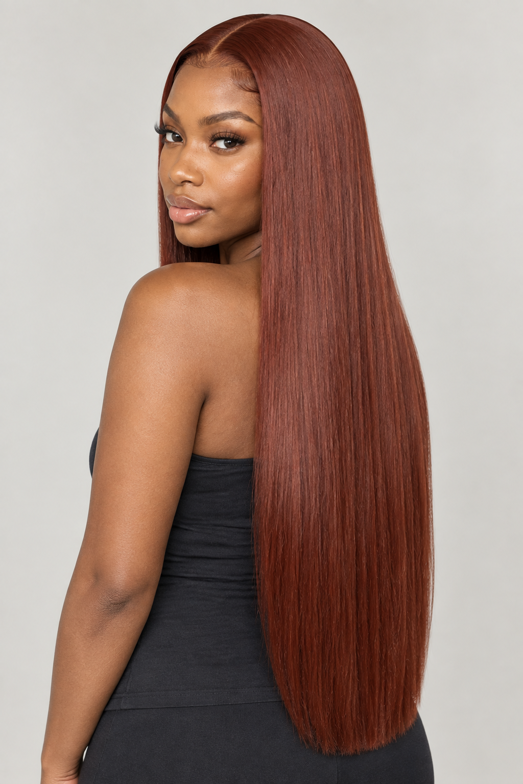 Warm auburn wig Black model back three-quarter view