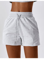 Load image into Gallery viewer, Drawstring Smocked Waist Sports Shorts
