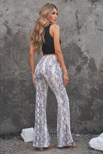 Load image into Gallery viewer, Snakeskin Print Flare Leg Pants
