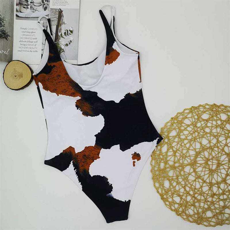 Cow Print One-Piece Swimsuit | Cross-Back Scoop Neck | The PM Edit