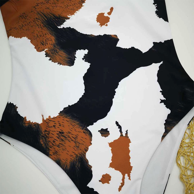 Cow Print One-Piece Swimsuit | Cross-Back Scoop Neck | The PM Edit